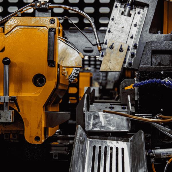 How do circular sawing machines achieve rapid and precision cutting in the manufacturing of auto parts?