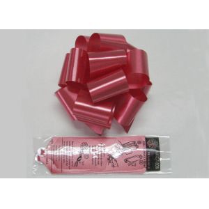 China Bright Red Poly Pom Pom Bow with Solid ribbon for wedding decoration and celebration on sale