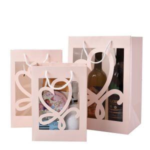 Buy cheap Custom Creative Colorful Paper handle Gift Bag Packaging With Transparent Window from wholesalers