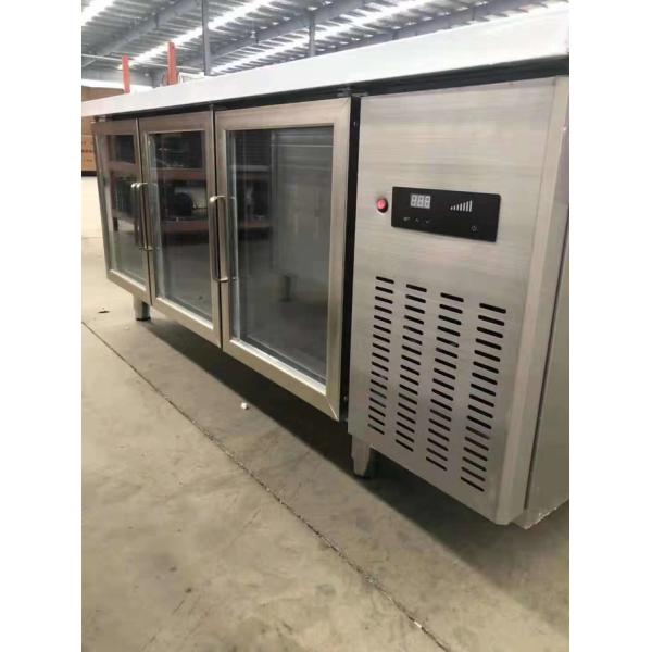 Stainless steel commercial refrigerator workbench in the back kitchen of hotel restaurant 2
