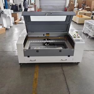 2025 New Design High Efficiency 6090 CO2 Laser Cutting Machine for Cloth &