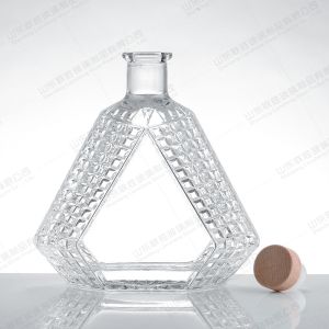 Buy cheap Customized Logo Acceptable Triangle Glass Gin Rum Wine Bottle with Honeycomb Pattern from wholesalers
