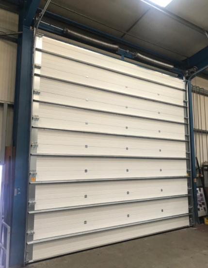 China High Security Lock Fire Station Industrial Sectional Doors with Automatic Formed and Emergency Release Fireproof Rolling Shutter Door Exporters on sale