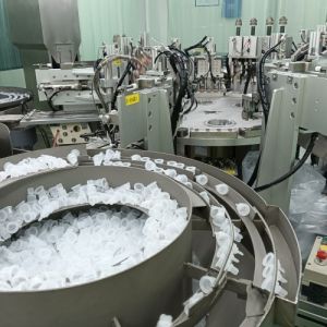 China Stable Pressure and Guaranteed Cap with Servo-Linked Rod Structure System Medical Infusion Bottle Caps Assembly Machine on sale