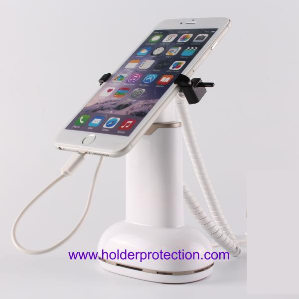 Buy cheap COMER plastic magnetic holder anti-theft security gripper cellphone stands with charger cable from wholesalers
