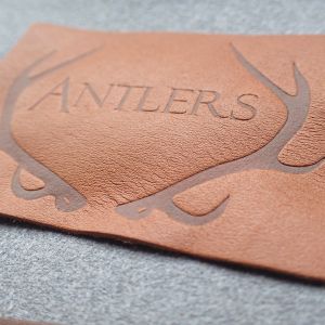 Buy cheap Customized Hot Stamped Antique Copper Embossed Leather Patches from wholesalers