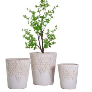 Buy cheap Smooth Honeycomb Pattern Neutral Beige Round Fiber Clay Planter from wholesalers