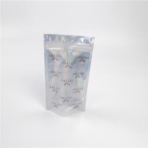 Buy cheap Shinny Glossy Hologram Cosmetic Packaging Bag Biodegradable With Transparent Front from wholesalers