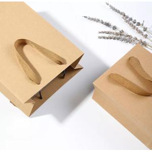 Buy cheap Handbag Kraft Paper Bag / Gift Bag Recyclable Drawstring Handle from wholesalers