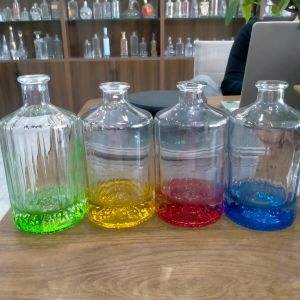 Buy cheap Gradient Yellow 750ml Round Glass Bottle For Whiskey Gin Tequila Lock Cap from wholesalers