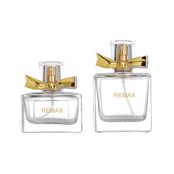 Quality Luxury 50ml Glass Perfume Bottle 10000pcs With Gold Bow Cap for sale