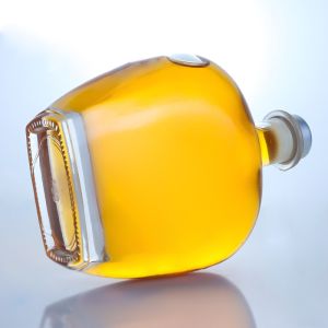 Buy cheap Clear Round Shape Glass Bottle for Gin Rum Champagne Brandy Whisky 700ml from wholesalers