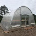 China Solar Dryer Greenhouse With 8mm PC Board And Ventilation Greenhouse Metal Frame Temperature for sale