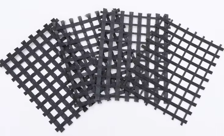 China Low Creep Woven Coated Bitumen Reinforcement Fiberglass Geogrid BX Grid Asphalt Overlay  Pavement on sale
