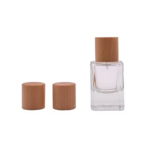 Buy cheap Factory Sale Beech Wooden Lid Perfume Bottle Cap Empty Glass With Sprayer Pump from wholesalers
