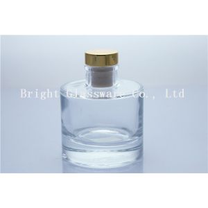 Buy cheap round glass perfume bottle with wooden lid from wholesalers