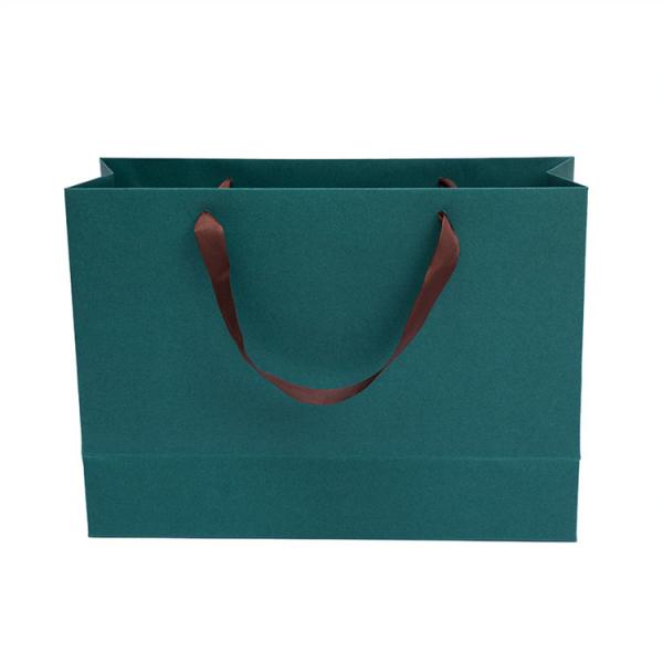 Buy cheap Clothing Packaging Paper Shopping Bags With Handles OEM ODM Supported from wholesalers
