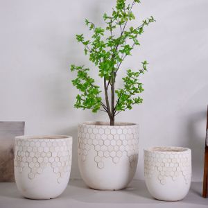 Buy cheap Natural Honeycomb Pattern Neutral Beige Round Lightweight Fiber Clay Planter from wholesalers