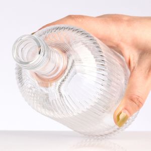 Buy cheap Clear Glass Collar Material 700ml/750ml/1000ml Beverage Liquor Round Empty Rum Bottle from wholesalers