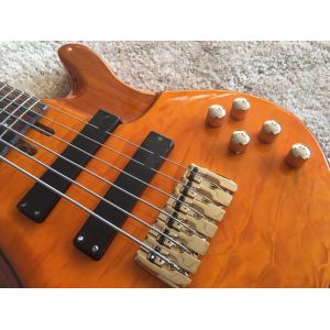 6 string bass guitar JP2 yellow quilted maple body back and front Active pickups