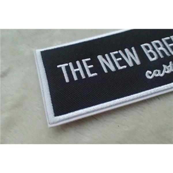 Quality Washable Black Polyester Custom Clothing Patches / Adhesive Embroidered Patches for sale