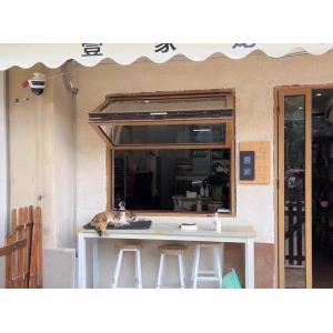 Balcony-Integrated Folding Window Enabling Container Gardening Access and Micro