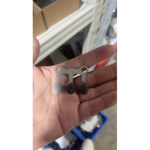 Quality High Precision Stainless Steel Stamped Mounting Plate – Dual-Hole Rectangular Window Design for Electronic or Mechanical Assembly** for sale