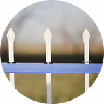 A white component steel fence panel with pressed spears suitable for various applications