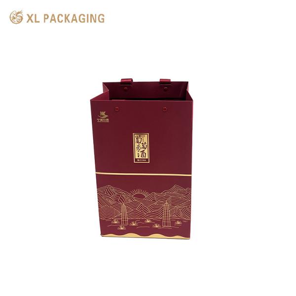 Buy cheap XL Packaging Custom Packaging Factory Eco friendly Red Paper Gift Bags One Wine Packaging Bags With Ribbon Handle from wholesalers