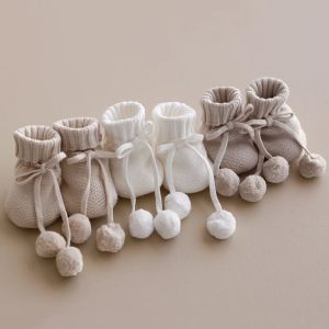 Buy cheap Y-Z Custom Design Unisex Baby Booties Breathable Cotton Knitted Soft Shoes with Pom Pom Cute Newborn Booties Pack of 200 Pairs from wholesalers