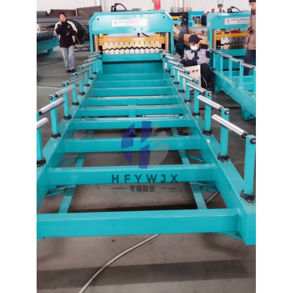Close-up view of palletizing machine chain drive system