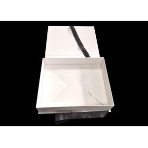 Buy cheap White Foldable Paperboard Apparel Packaging Box With Ribbon Closure from wholesalers