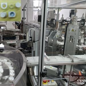 Buy cheap Customizable Milk Paper Bottle Cap Assembly Machine For Automatic Heli Cover Capping Machine from wholesalers