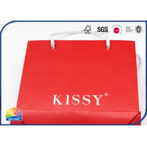 China Recycled Luxury Handle Glossy Kraft Paper Gift Bag With Custom Logo on sale