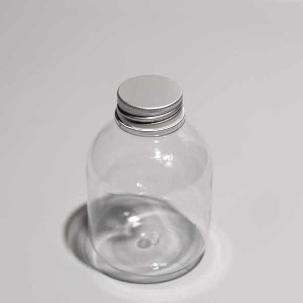 Buy cheap Transparent PET Bottles with Screw On Aluminum Caps from wholesalers