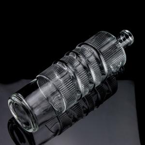 Buy cheap Luxury Embossed Glass Bottle 750ml 1000ml Clear Flint Gin Rum Champagne Tequila Whisky Bottle with Cork from wholesalers