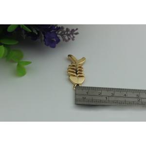 Buy cheap Small light gold fish bones pattern zinc alloy metal handbag logo label tags for sales from wholesalers