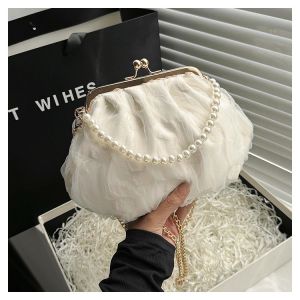 Buy cheap 2024 NEW RETRO FAIRY SOLID COLOR SMALL BAG WHITE HAND PEARL BAG WOMEN'S NET YARN INS SIMPLE CROSSBODY BAG from wholesalers