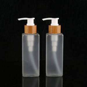 Buy cheap Frosted Clear Screw Plastic Lotion Bottles With Bamboo Pump Shell from wholesalers