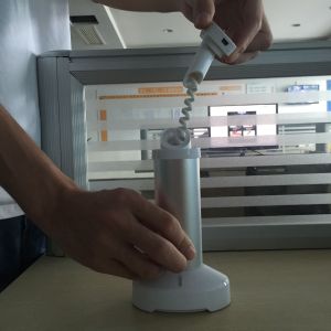 COMER anti-theft alarm devices for gsm cellphone Adjustable Gripper Alarm easel