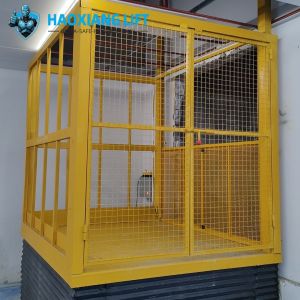 Buy cheap Unmovable Hydraulic Scissor Lift: Hydraulic smooth lifting, perimeter shields , easy push-button control, durable steel—ideal for factory heavy tasks. product