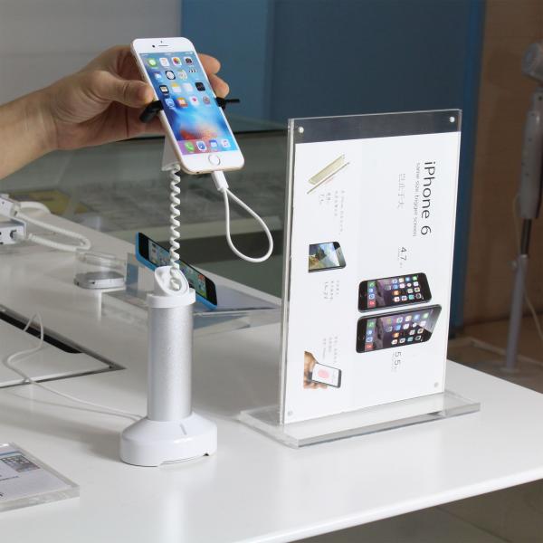 Buy cheap COMER alarm mobile phone gripper stand with charging from wholesalers