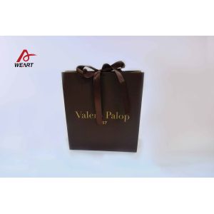 Buy cheap Surface Hot Stamping Personalised Paper Carrier Bags With Ribbon Bowknot from wholesalers