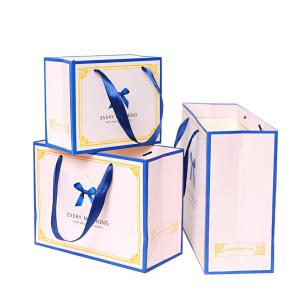 Buy cheap White Paper Shopping Bags With Handles Matt Lamination Surface from wholesalers