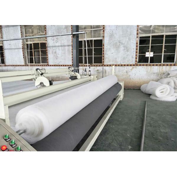 NON-WOVEN WINDING AND CUTTING MACHINE