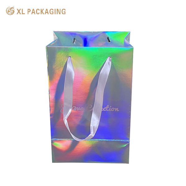 Quality XL Packaging Custom Packaging Factory Custom Logo Printing Small Size Holographic Advertising Glitter Hologram Silver Foil Gift Carrier Paper Bag for Jewelry for sale