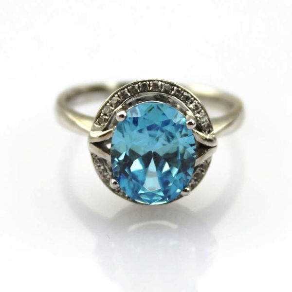 Quality Sterling Silver 8mmx10mm Oval Blue Topaz  Cubic Zircon Ring  (R182) for sale