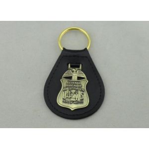 China Die Stamping Personalized Leather Keychains With 3D Antique Brass Emblem on sale
