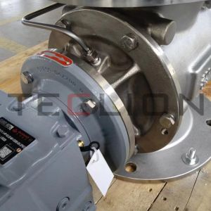 Rotary feeder with PTFE coating on rotor