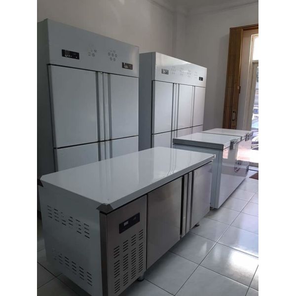 Stainless steel commercial refrigerator workbench in the back kitchen of hotel restaurant 4